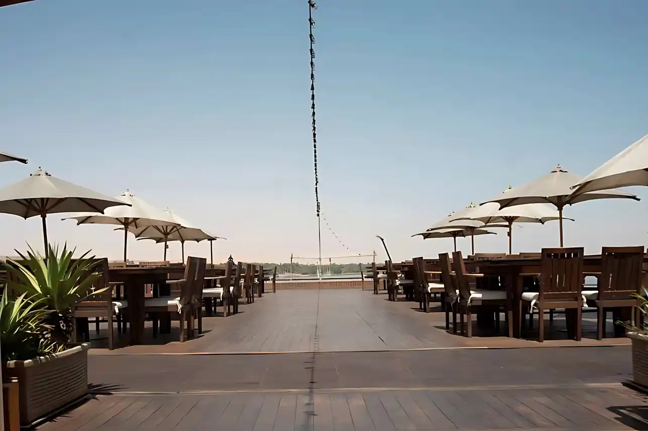 Sun deck aboard the M/S City & Sea Adonis with shaded seating and Nile River views.